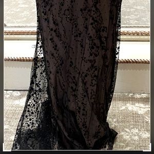 Black off shoulder formal gown with train